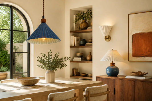 Ceramic pendant, wall sconce and table lamp in a warm contemporary interior