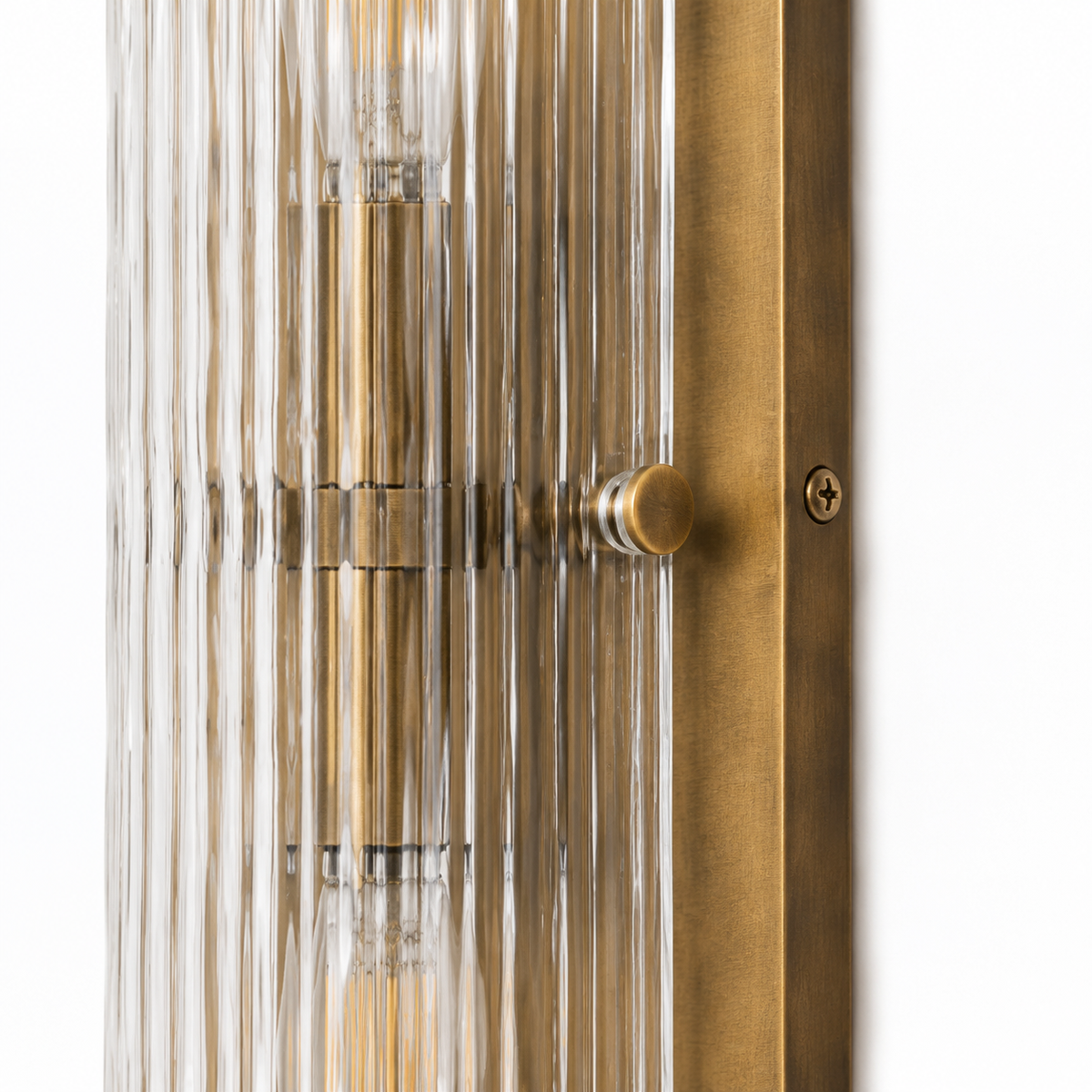 Close detail of Kiera's Burnished Brass backplate and retaining pin