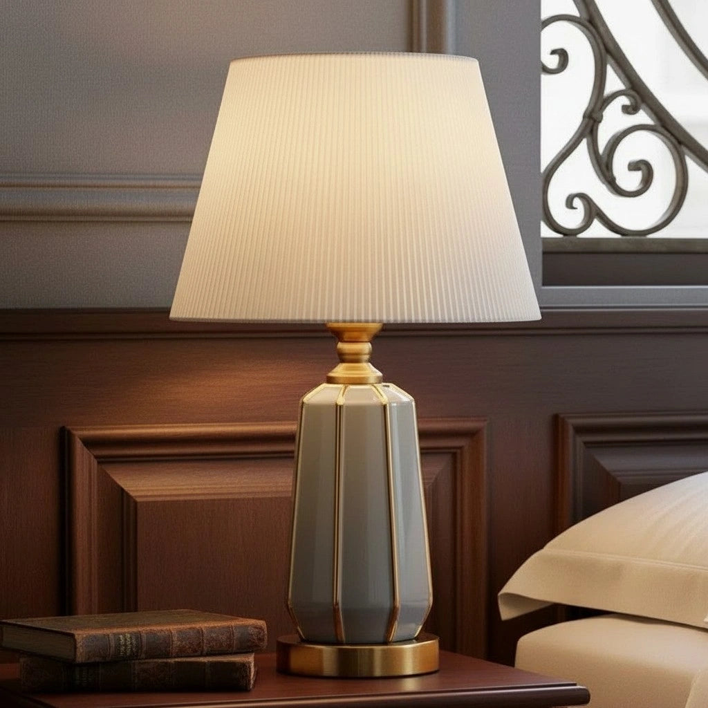 Classic pleated ceramic and fabric table light