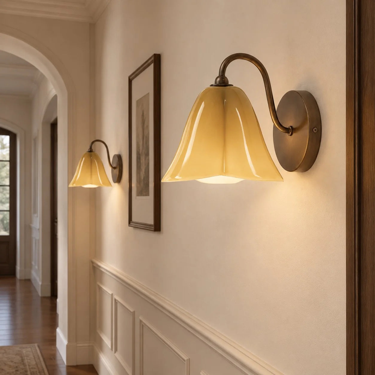 Goldenrod Nikolas wall sconce in a hallway