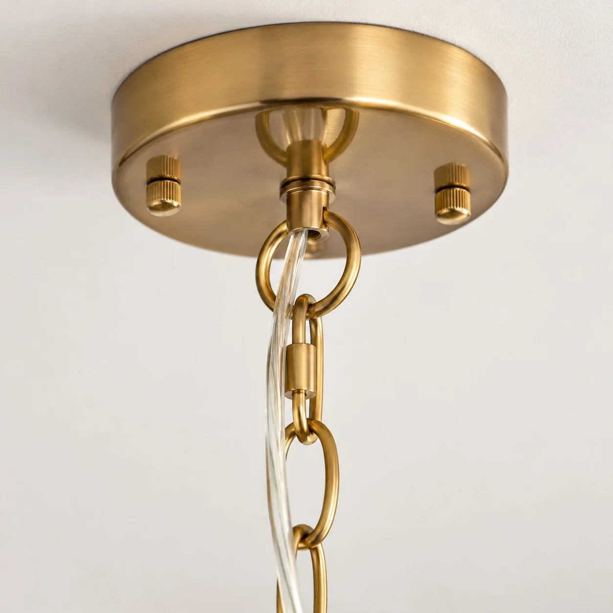 Gold Fable ceiling canopy and chain hardware close-up