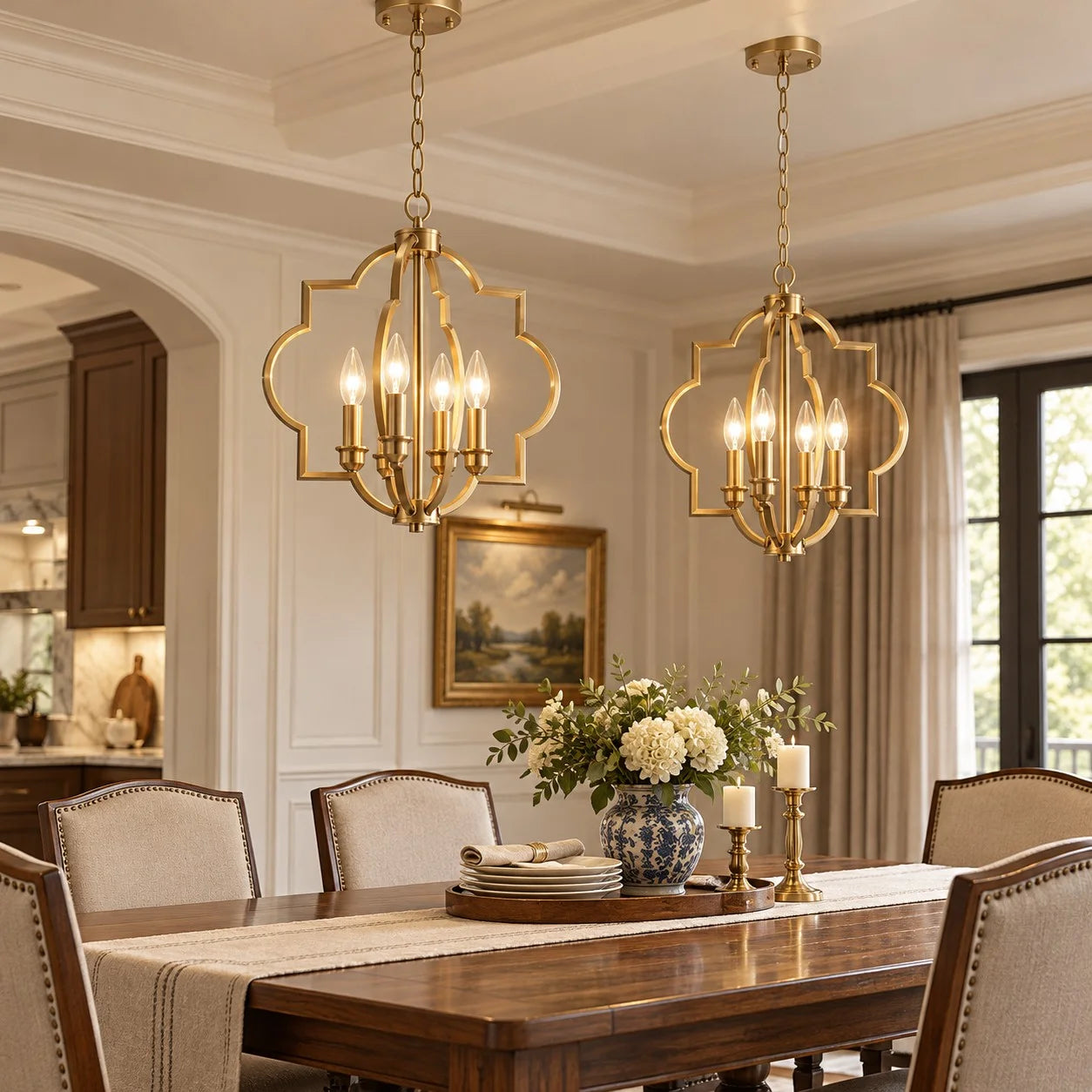 Gold Fable chandelier over a dining table