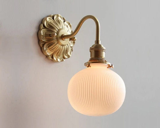 Ribbed Ceramic Ball Shaped Wall Light with Brushed Brass Carved Flower Lamp Fixture