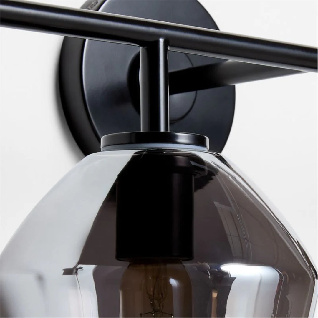 Elara Modern Glass Metal Geometric Wall Sconce detail1.webp__PID:14499fa9-6b3d-48ef-ad0a-fa58760776df