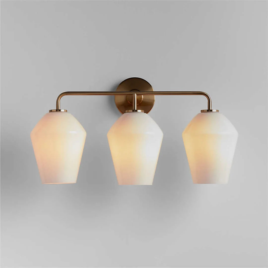 Elara Modern Glass Metal Geometric Wall Sconce milk brass.webp__PID:3090f404-22cb-427e-85c1-94b93a59defe