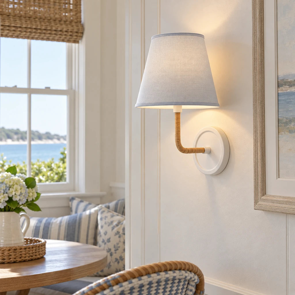 Elodie Rattan Wrapped Single Wall Sconce, White / Coastal Blue Taper installed close view