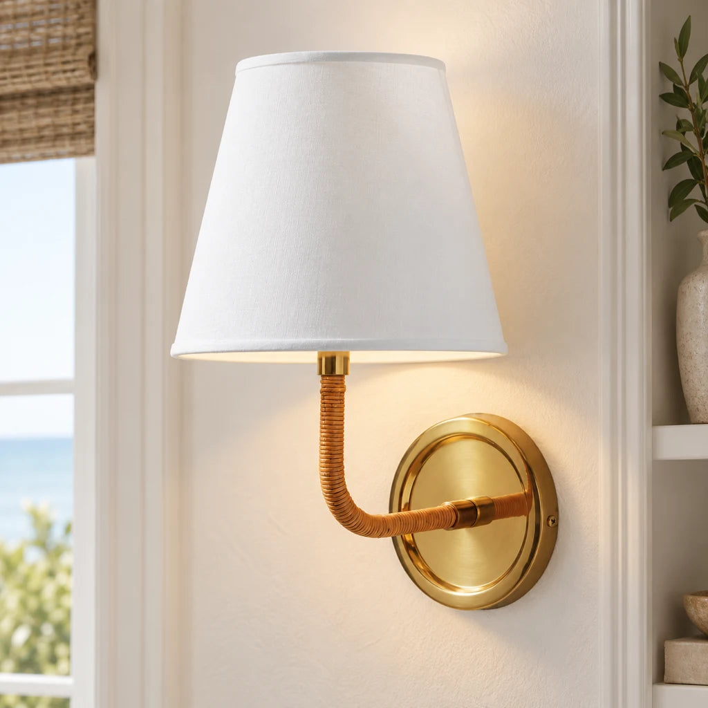 Elodie Rattan Wrapped Single Wall Sconce, Brass / White Taper installed SKU image