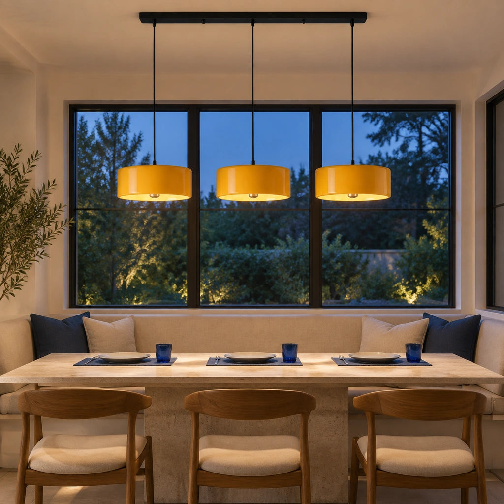 Emery Modern Glass Drum Pendant Light - Orange triple - home dining banquette lifestyle view - triple-orange-night