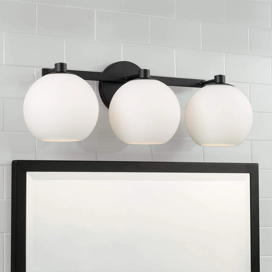 Lucas Modern Triple White Globe Wall Sconce