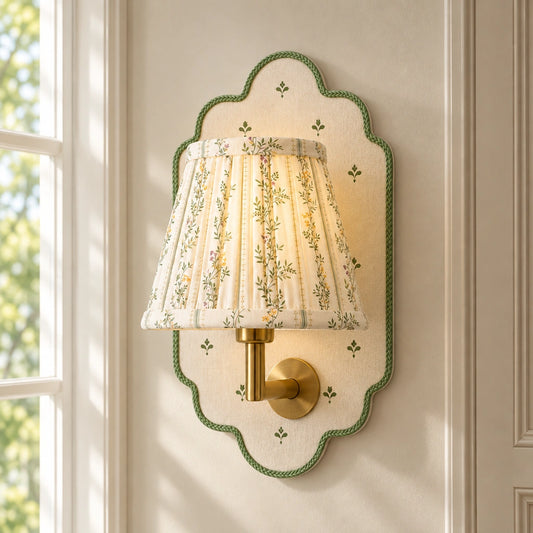Maribel Vintage Floral Fabric Wall Sconce, floral cotton wall sconce with a green-trimmed scalloped backplate