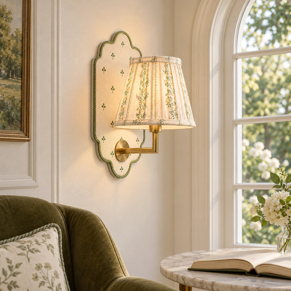 Maribel Vintage Floral Fabric Wall Sconce, illuminated in a bright reading nook