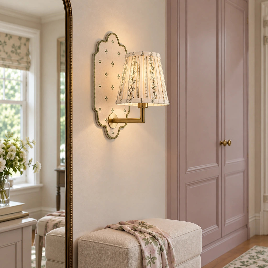 Maribel Vintage Floral Fabric Wall Sconce, installed beside a dressing-room mirror