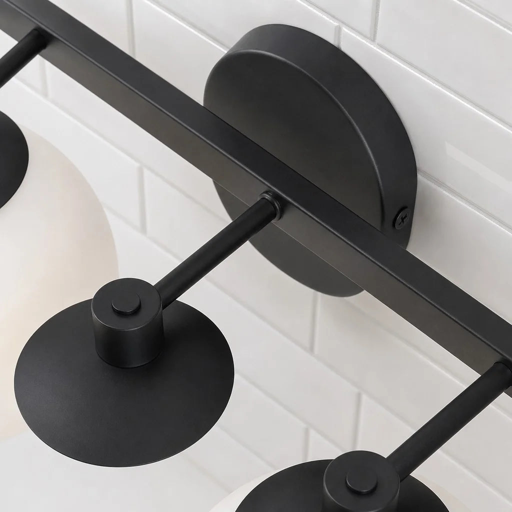 Marlow Modern Triple White Globe Wall Sconce1.webp__PID:748e6fd6-5af4-4b47-acee-8d17e6580594