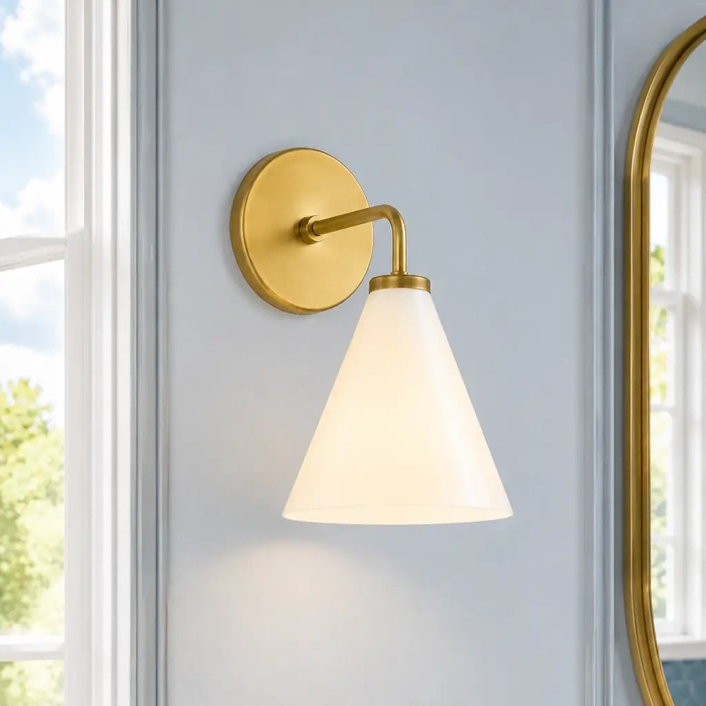 Zorya industrial brass cone shade wall sconce, Milk Glass, installed close view