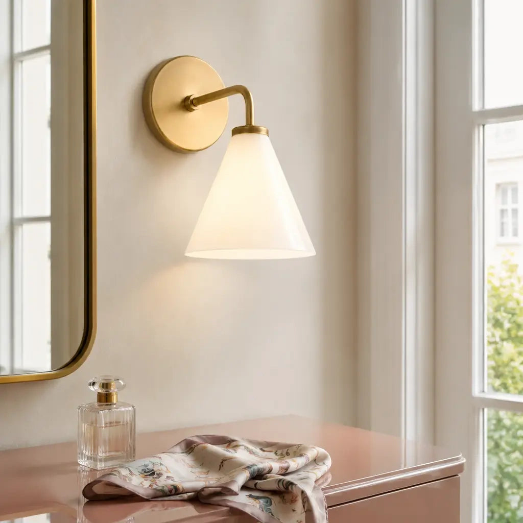 Zorya industrial brass cone shade wall sconce, Milk Glass, installed close view