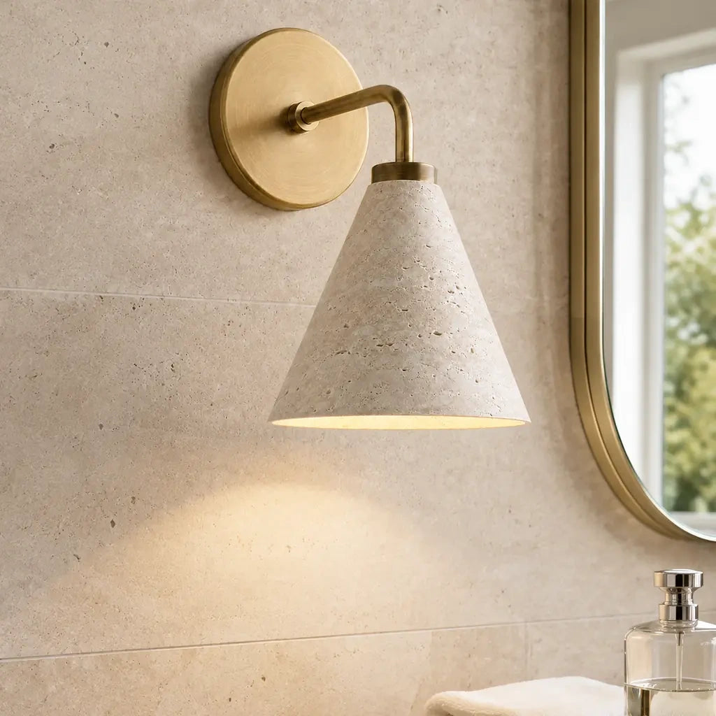 Zorya industrial brass cone shade wall sconce, Travertine, installed close view