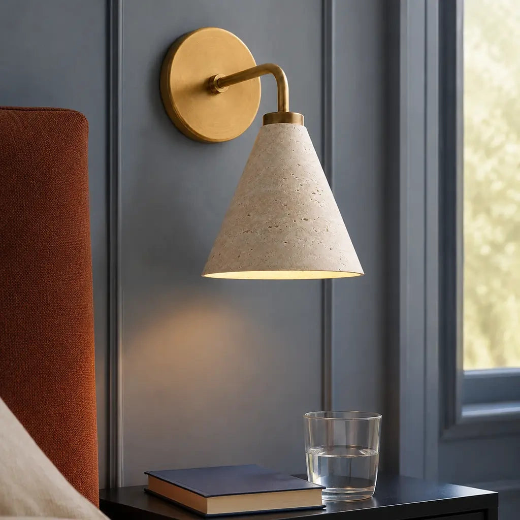 Zorya industrial brass cone shade wall sconce, Travertine, installed close view