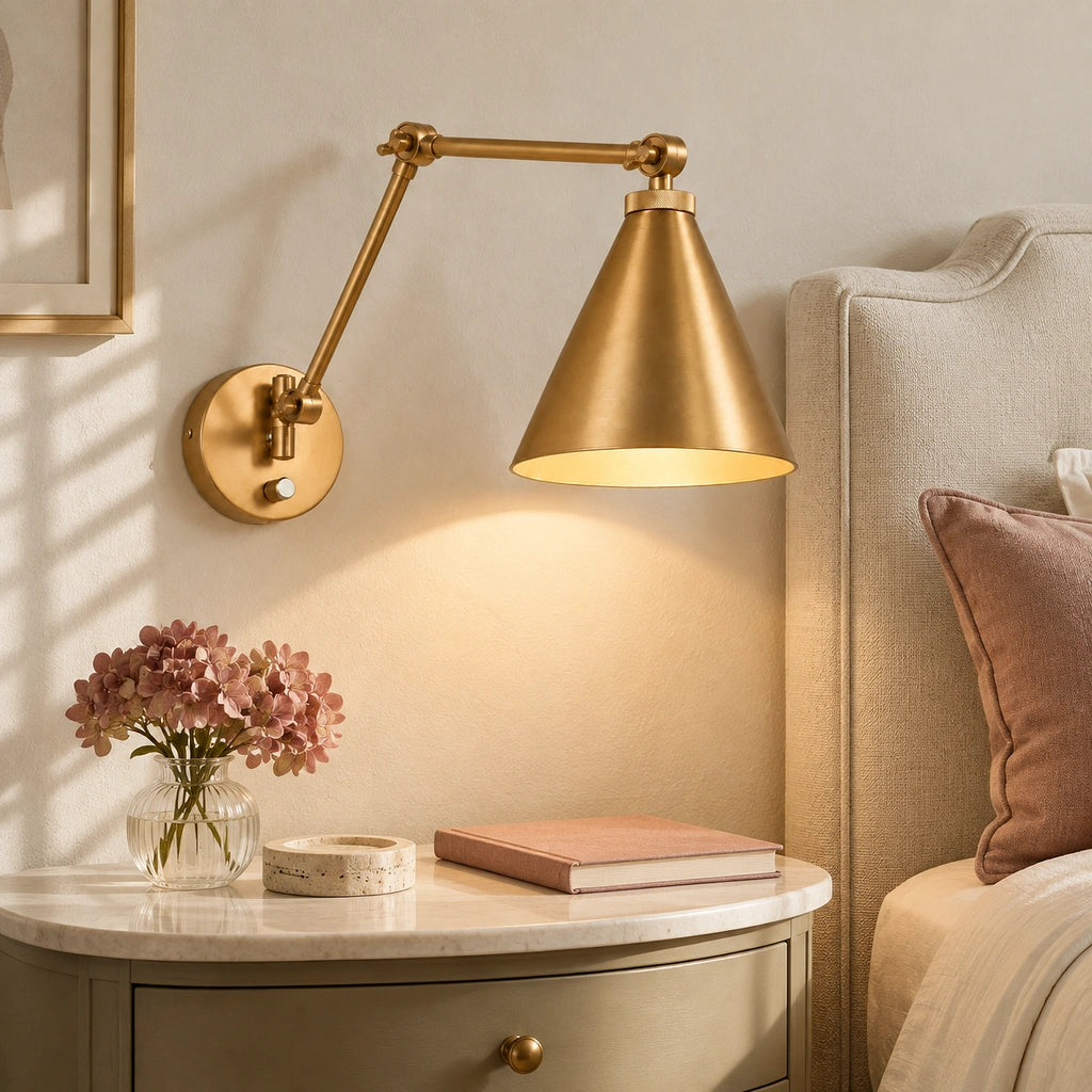 Zorya Industrial Metal Swing Arm Wall Sconce, illuminated beside a bedroom nightstand