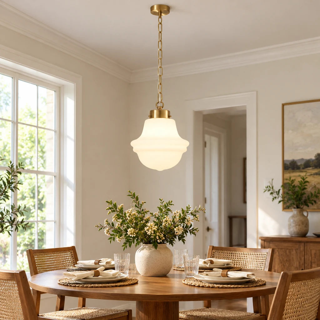 Liora pendant, Antique Brass medium dining scene with long chain
