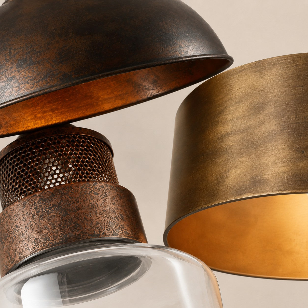 Rustic metal lighting in aged copper and brass finishes